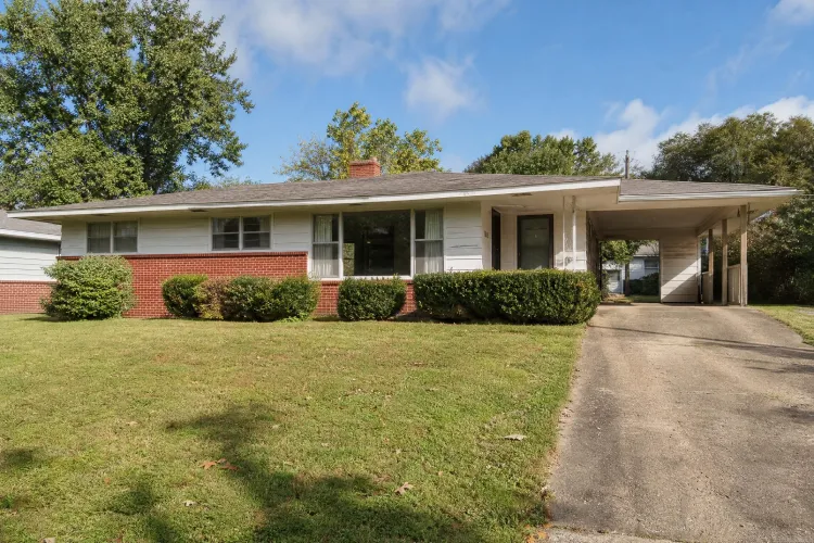 renovating a 1960s house exterior before makeover