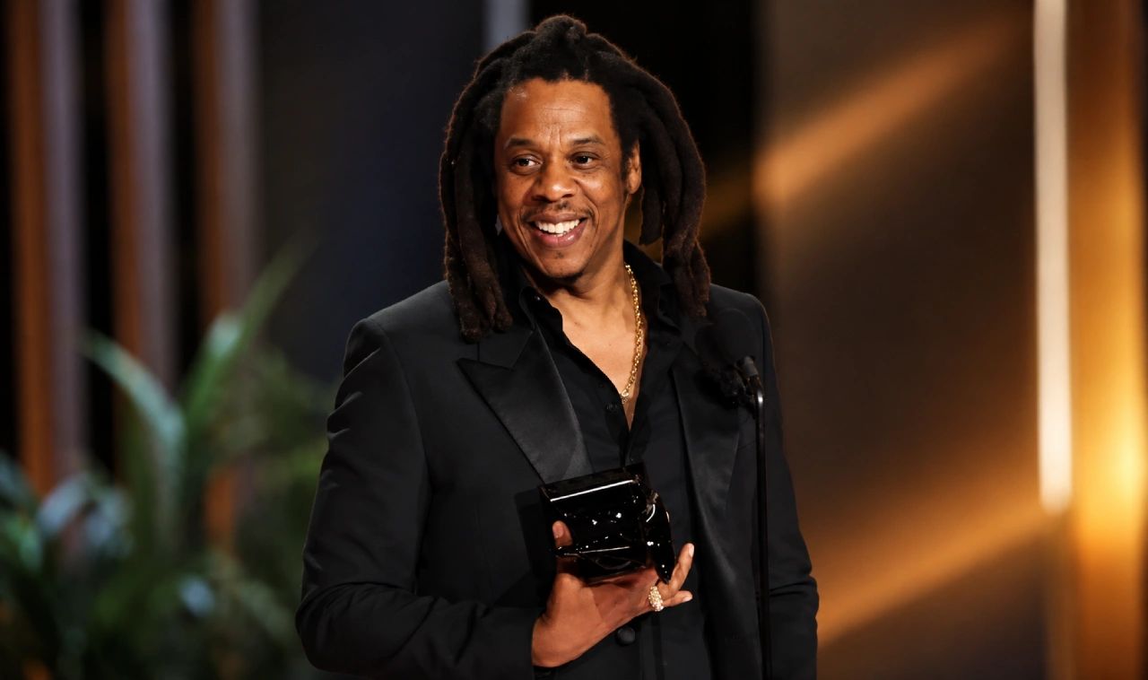 Champagne, cognac and music icons representing Jay-Z's spirits brands and music catalog wealth